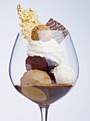 An ice cream sundae with three kinds of chocolate ice cream