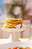 Pita breads on a cake stand