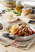 Osso buco (stewed cross-cut veal shin) with fettuccine