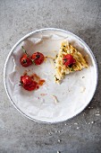 A slice of fennel gratin with cherry tomatoes