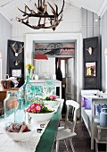 Small shop containing old furniture and vintage and country-house-style home accessories