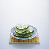 Lime slices on a white plate