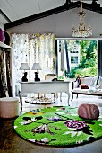 Green rug with modern pattern in front of white antique furniture