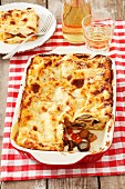 Lasagna with porcini mushrooms and tomatoes