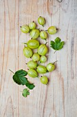 Gooseberries on a wooden surface