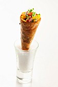 Tuna with vegetables and edible shoots in a wafer cone