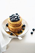 Pancakes with blueberries and maple syrup