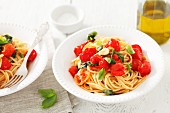 Spaghetti with tomatoes and basil