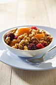 Muesli with apricots and raspberries