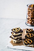 Peanut butter bars with chocolate and pretzels
