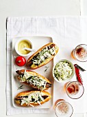 Bread rolls with grilled sausages, coleslaw with dill, mustard and beer