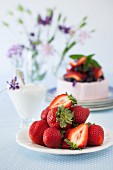 Fresh Strawberries with a Yogurt Cake in the Background