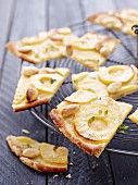Tarte flambée with apples, almonds and thyme