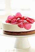 Raspberry cheesecake with rose petals