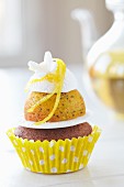A lemon cupcake with meringue