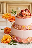 Two-tier layer cake with candied rose petals