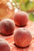 Peaches in front of a basket