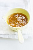 Apricot jam with ginger in a small saucepan