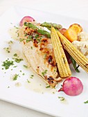 Grilled chicken breast with butter sauce and baby sweetcorn