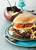 Cod burger with coleslaw and fried onions