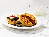 Waffles with blueberries and maple syrup