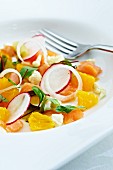 Salmon confit with oranges, radishes and shallots