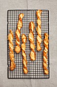 Cheese sticks on a wire rack