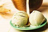 Two scoops of home-made green tea ice cream with Japanese matcha accessories