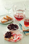 Provençal tapenade with black olives and capers served with white bread and rose wine