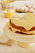 Boston Cream Pie, sponge cake with a vanilla cream filling and a white chocolate glaze