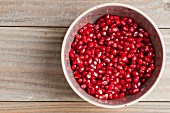 Pomegranate seeds in a bowl