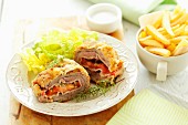 Chicken Cordon Bleu with lettuce and chips
