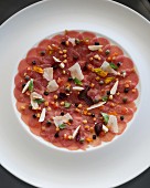 Veal carpaccio with diced vegetables