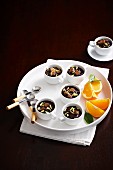 Chocolate mousse with orange liqueur in coffee cups