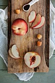 Preparing peaches on a wooden board