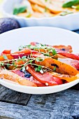 Grilled root vegetables on a plate, Sweden.