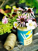 Flowers in a vase in a garden, Sweden