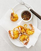 Prawns deep-fried in angel's hair noodles, with chilli sauce