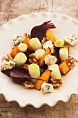 Leek with beetroot, blue cheese and walnuts