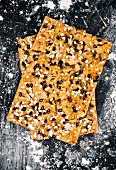 Crispbread with thyme on metal sheet, directly above