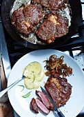 Rib eye steak with thyme-flavoured onions and a tarragon sauce