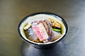 Assorted fresh fish and seafood in a bowl