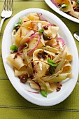 Pappardelle pasta with fennels and olives, Italy