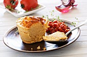 Fish soufflé with tomato and pepper sauce