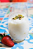 Rice pudding with pistachios (dessert from Egypt)