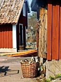 Firewood in front of a smokehouse, Sweden.