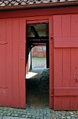 An Open Door on a Barn.