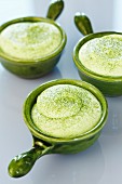 Matcha mousse in green bowls