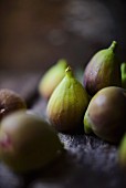 Fresh figs on a wooden surface
