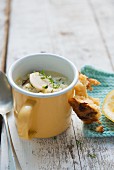 Leek and potato soup with celeriac and smoked fish